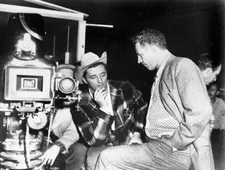 Robert Mitchum with Nicholas Ray on the set of Lusty Men
